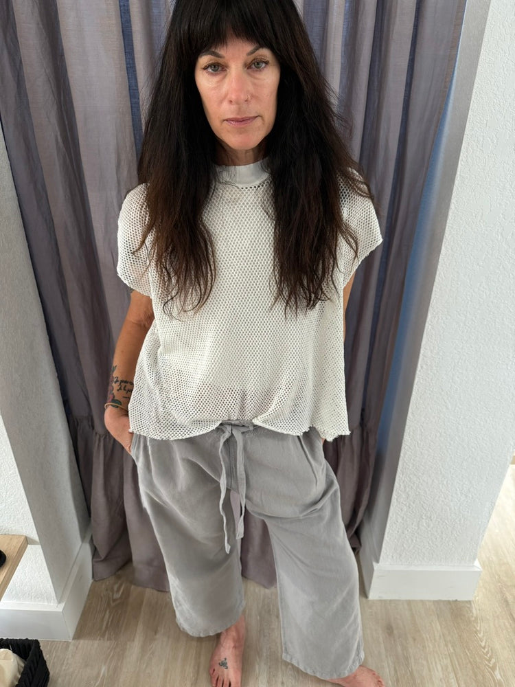
                  
                    PLEATED GREY CROP PANT
                  
                