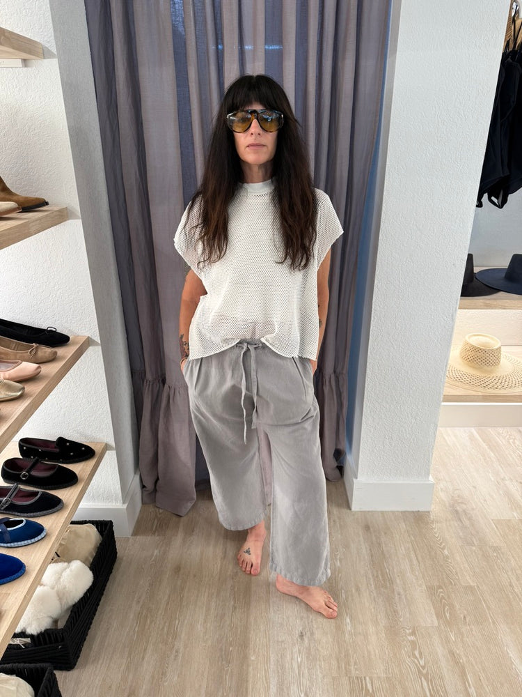 
                  
                    PLEATED GREY CROP PANT
                  
                
