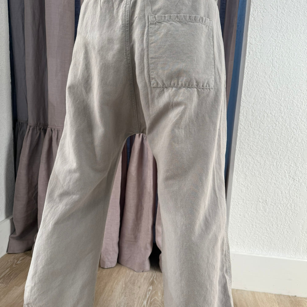 
                  
                    PLEATED GREY CROP PANT
                  
                