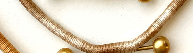
                  
                    BRASS BALL NECKLACE
                  
                
