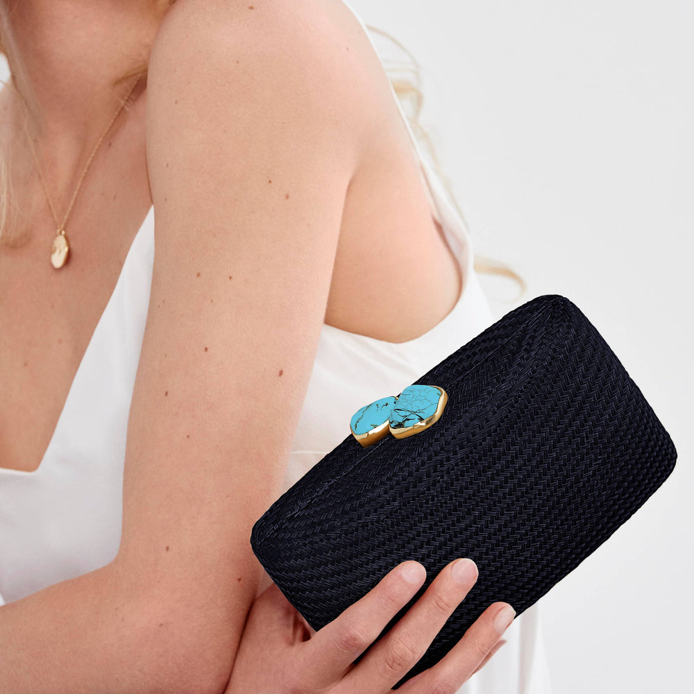 
                  
                    JEN TURQUOISE CLUTCH
                  
                